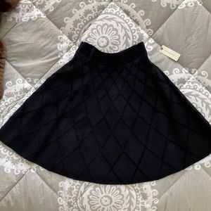 Maeve for Anthropologie black flare skirt. Lattice print.